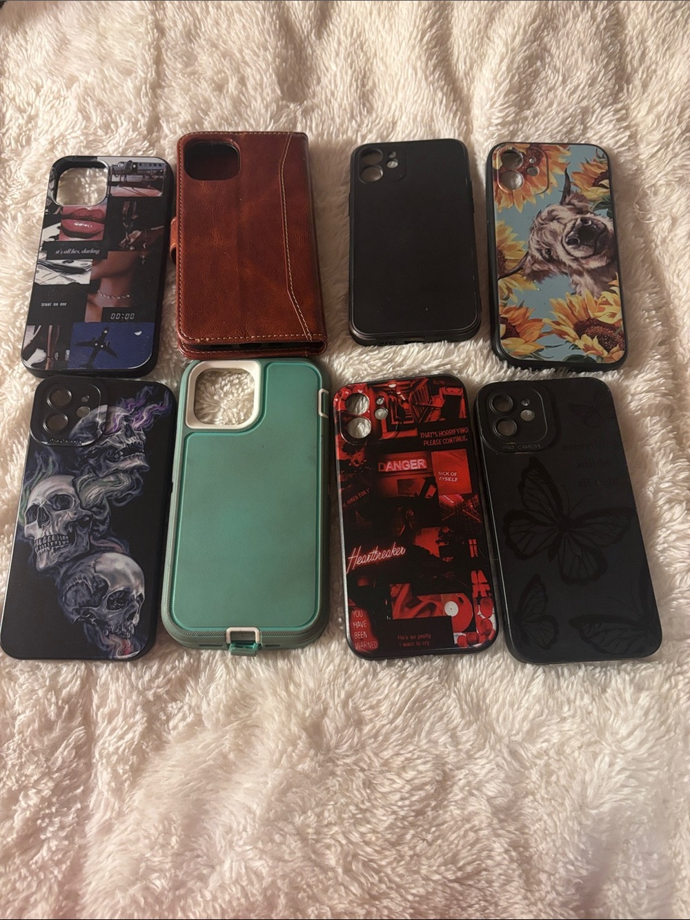 Assorted Phone Cases - Black, Brown, Teal, Red, Floral & Graphic Designs